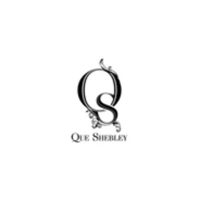 Que Shebley